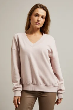 Bluzy Damskie Bez Kaptura>Moodo Bluza z dekoltem w serek i długimi rękawami różowa