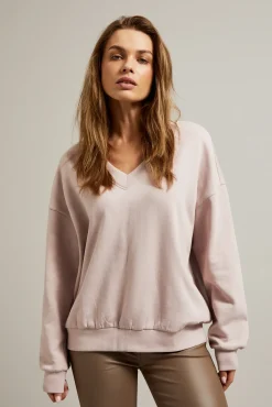 Bluzy Damskie Bez Kaptura>Moodo Bluza z dekoltem w serek i długimi rękawami różowa